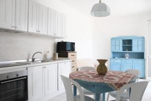Kuchyň nebo kuchyňský kout v ubytování Casa La Strea - Vivi Salento