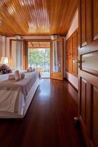 Posteľ alebo postele v izbe v ubytovaní Summerday Villa Private Beach