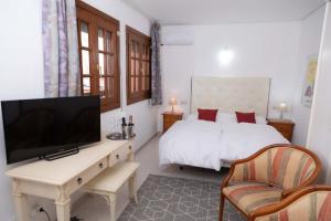 A television and/or entertainment centre at Apartamento Marina Nacional