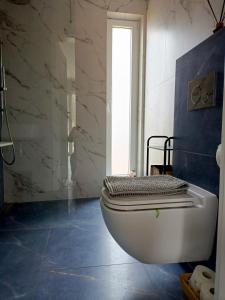 Koupelna v ubytování Domki Szychówka + 43 fotografií