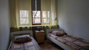 Posteľ alebo postele v izbe v ubytovaní Velvet Apartament Kopińska