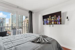 Una cama o camas en una habitación de Perfectly Located Miami 3BR with Stunning Views 45 fotos más