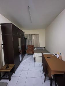 Posezení v ubytování Studio Apartment