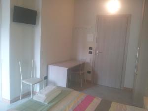 Postel nebo postele na pokoji v ubytování B&B Bianchi 64