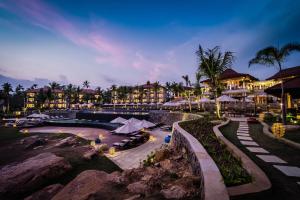 a resort with a swimming pool and a resort at Anantara Peace Haven Tangalle Resort in Tangalle