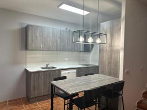A kitchen or kitchenette at TPA - Les Tres Cales - 1