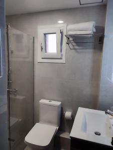 Koupelna v ubytování Plaza Hotel