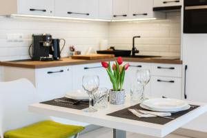 A kitchen or kitchenette at Németh Apartmanok