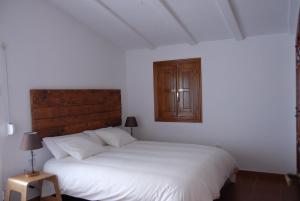 Postel nebo postele na pokoji v ubytování Finca Horno de Cal