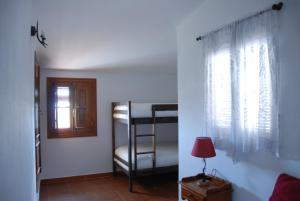 A bed or beds in a room at Finca Horno de Cal