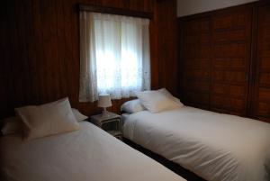 A bed or beds in a room at Finca Horno de Cal