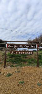 a sign that says camp alla campanaanaartist at Agriturismo Campo alla Cantina appartamento Papavero-Malva in Gavorrano