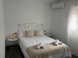 Postel nebo postele na pokoji v ubytování Casa El Abuelo Tomás + 74 fotografií