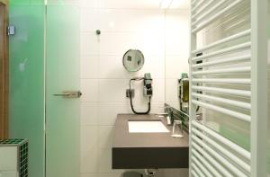 Koupelna v ubytování Hotel Holl