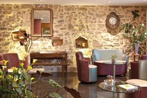 Posezení v ubytování L'Auberge Campagnarde