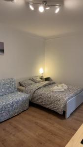 Chambre double à Niederkorn 객실 침대