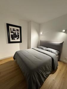 En eller flere senge i et værelse på Le renouveau