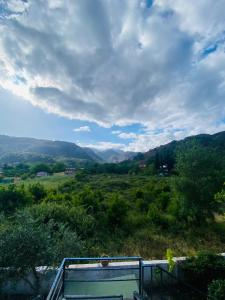 a view of a hill with a swimming pool at Black Cat Villa's in Kemer