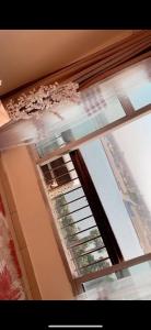 a window in a room with a window blind at المعادي in Cairo