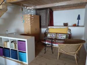 a living room with a couch and a table at La luna in pesci in Biassa