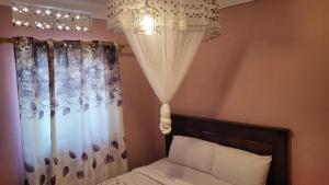 Gallery image of Opamu Homes Entebbe in Entebbe +16 photos