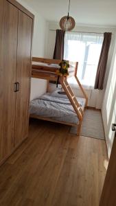 Postel nebo postele na pokoji v ubytování Apartmán u Rákosníčka