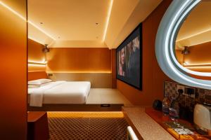 Postelja oz. postelje v sobi nastanitve Super Time Trendy Design Hotel Guangzhou Beijing Road Pedestrian Street Dafo Temple Branch