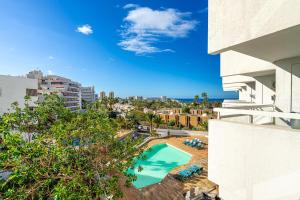 a view of a swimming pool from a building at GOLDEN VIEW Ponderosa in Costa de Adeje