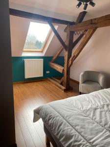 Postel nebo postele na pokoji v ubytování Le refuge de Séve - Loft de Yves
