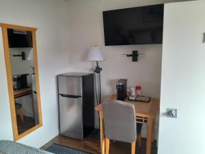Sunset Motel tesisinde mutfak veya mini mutfak