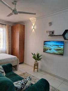 Postel nebo postele na pokoji v ubytování Phoina homes