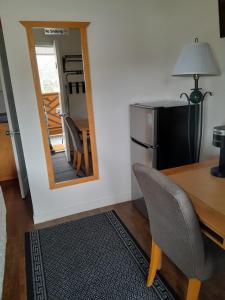 Sunset Motel tesisinde bir televizyon ve/veya eğlence merkezi