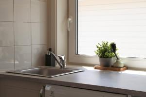 Köök või kööginurk majutusasutuses Lofoten Værøy Bryggehotell AS