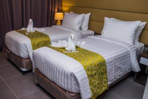 Postel nebo postele na pokoji v ubytování Hotel Costa Brava