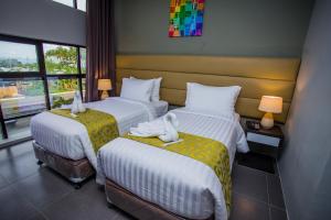 Postel nebo postele na pokoji v ubytování Hotel Costa Brava