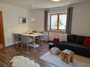 Χώρος καθιστικού στο Ferienwohnung Murmeltier