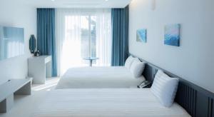 Hotel Sollavue客房内的一张或多张床位