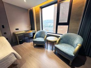 Posezení v ubytování National Jade Hotel