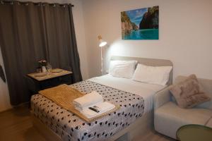 Postel nebo postele na pokoji v ubytování Dcondo Reef Modern Condos 1&2 Bedrooms + 46 fotografií