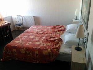 Voodi või voodid majutusasutuse Hotel Getliin toas