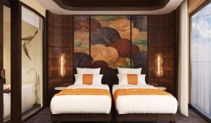 Кровать или кровати в номере Amiana Resort Cam Ranh
