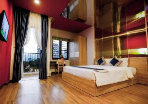 Ένα ή περισσότερα κρεβάτια σε δωμάτιο στο Mata Love hotel