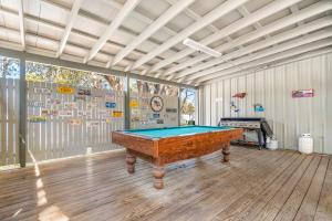a room with a pool table in it at Happy Travelers RV Resort in Thonotosassa