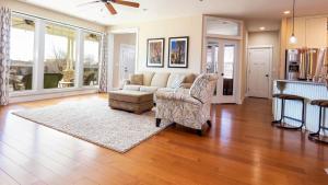 a living room with a couch and a chair at Luxury Pet-Friendly Kanab Home Quiet Neighborhood in Kanab +38 photos