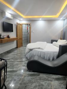 TV a/nebo společenská místnost v ubytování Hotel & Homestay LABUBU