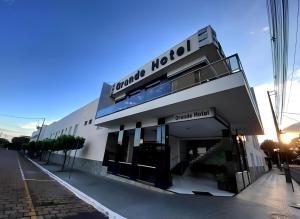 a building with a sign that reads ramachi hotel at Grande Hotel in Paranavaí