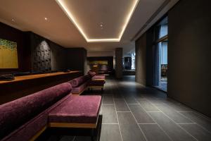a bar with benches and a pool table at Hotel Vista Premio Kyoto Nagomi tei in Kyoto