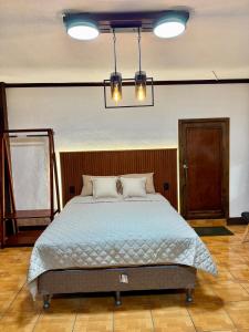 Ένα ή περισσότερα κρεβάτια σε δωμάτιο στο Colina de Tzancucha