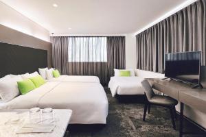 TV a/nebo společenská místnost v ubytování Hotel Ease Tsuen Wan