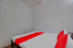 Postel nebo postele na pokoji v ubytování Hotel O K S Inn Hotel + 26 fotografií